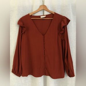 uni. thread burnt orange long sleeve w/ buttons and ruffles and all the things!